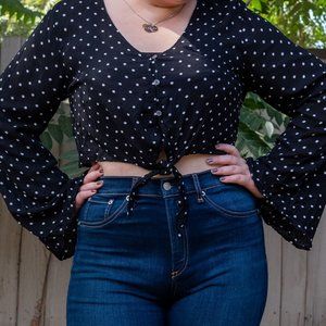 Bell sleeve polka dot top.